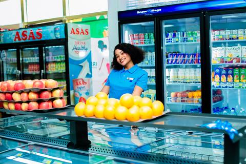 Staff member at snacks section